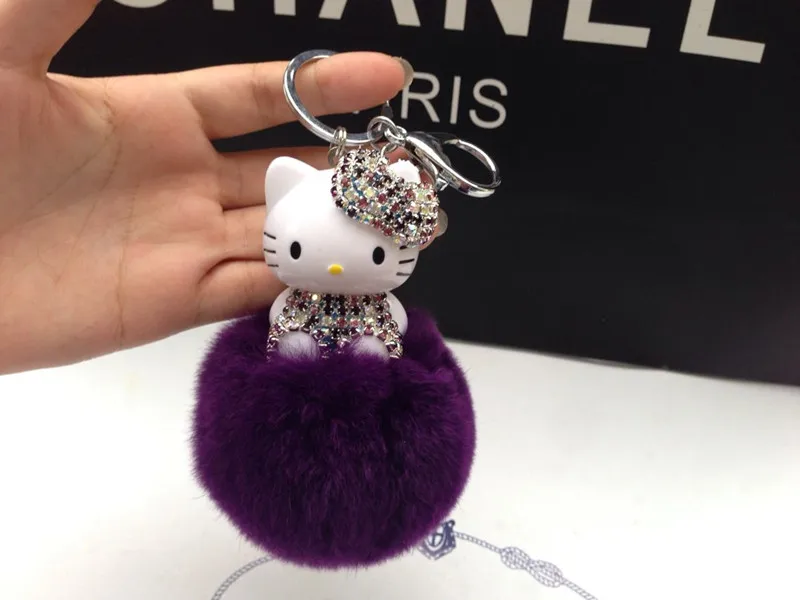 Hello Kitty Colorful Bells Crystal Pompom Leather Metal Pendant